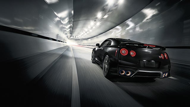 2023 Nissan GT-R seen from behind driving through a tunnel | Merchant Nissan in Troy AL